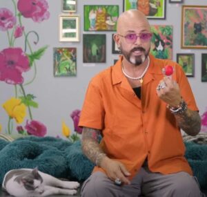 Jackson Galaxy. Is he a visionary? a weirdo? a bad shaver? yes. and he knows a bit about clicker training a cat